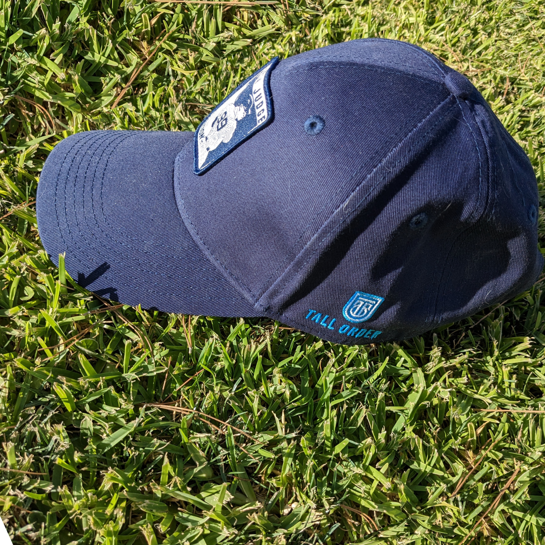 Side view of Navy ALL RISE Baseball Cap
